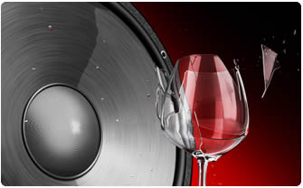 Wine glass shattering next to a loud speaker